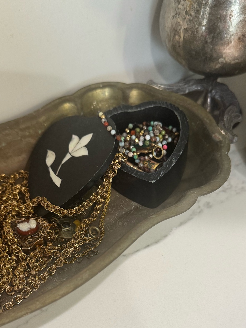 Little vintage carved stone trinket box with mother of pearl inlay.